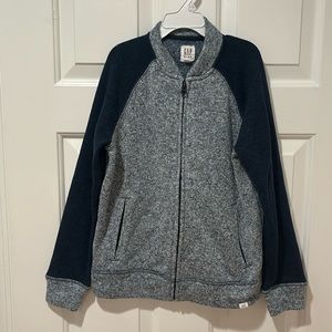 Boys zip up jacket from the gap size medium. Blue and gray colors